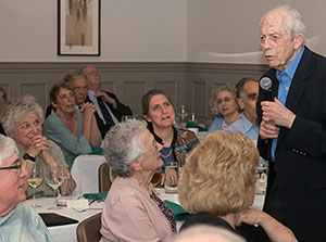 Michael speaks at party