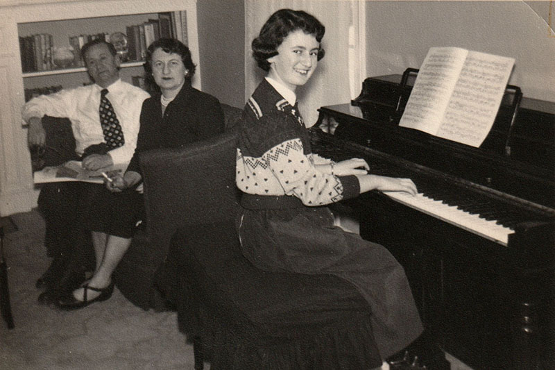 Jessica at piano w Jack and Belle in BG