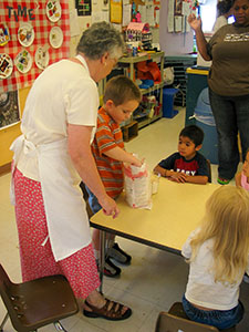 Jessica baking at Zelda E. DCC